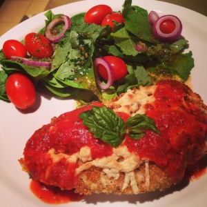 Quinoa Crusted Chicken Parmesan with salad with homemade Italian dressing